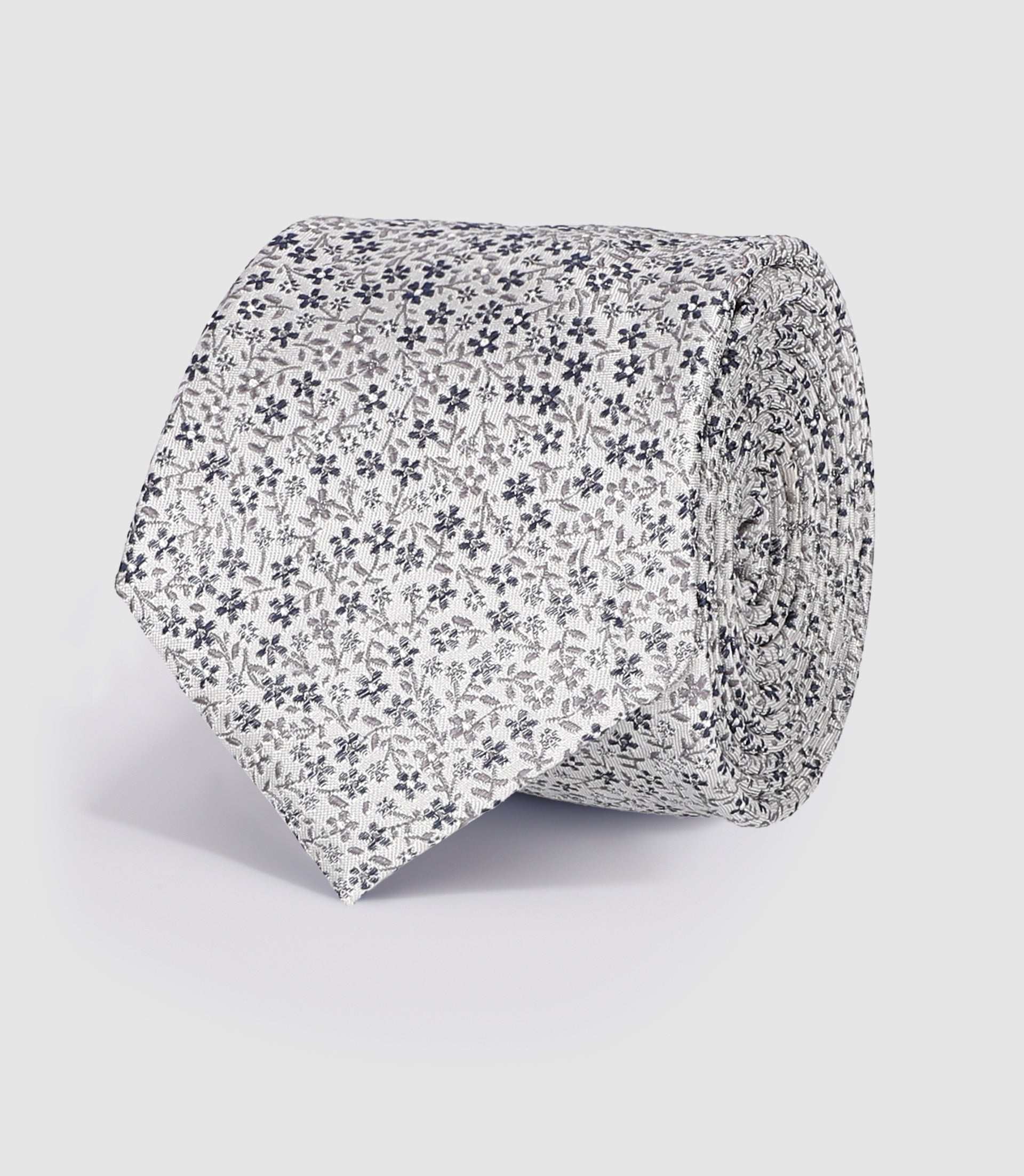 Cravate en soie gris à motif fleuri UCINIA - IZAC