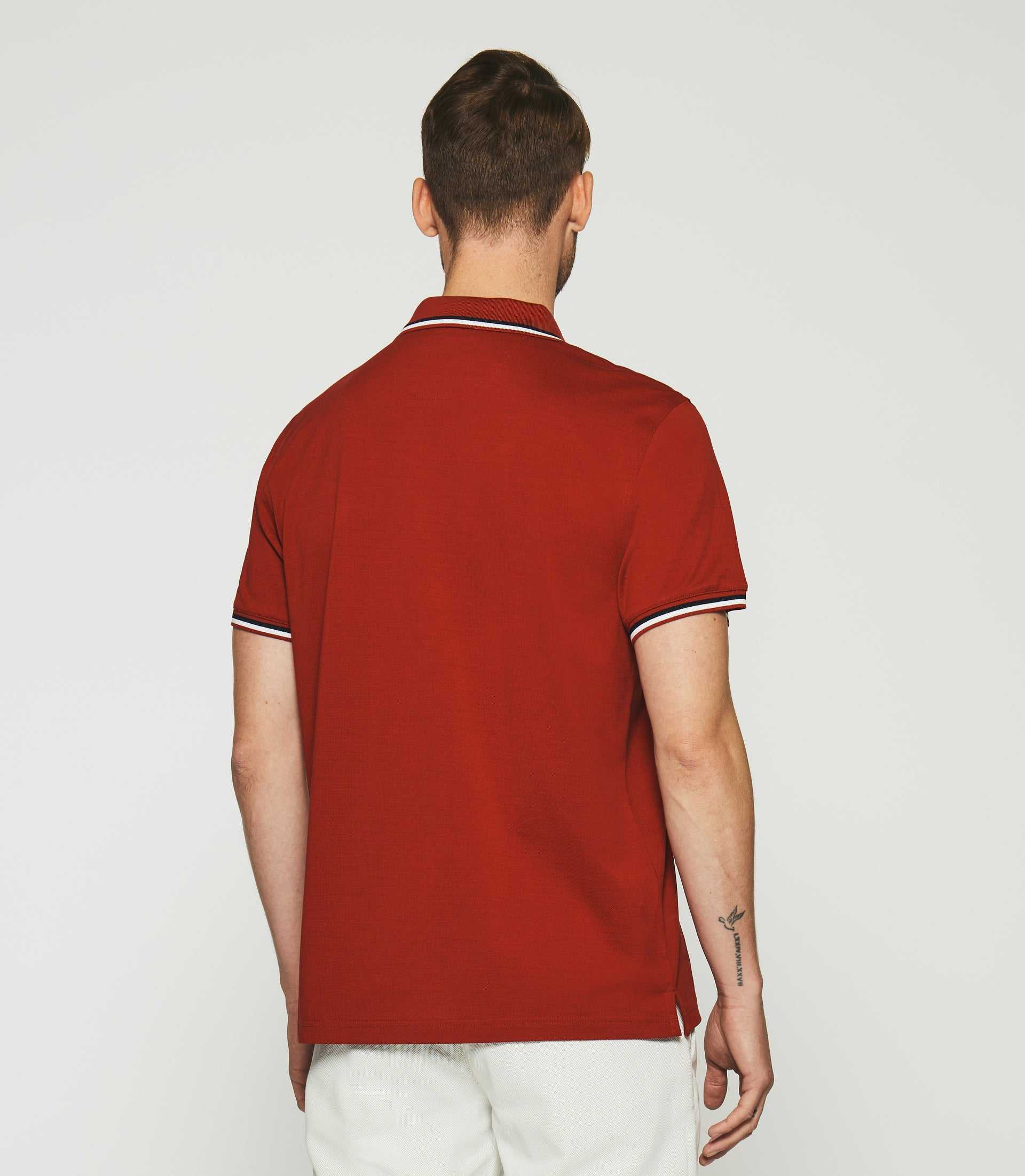 Polo uni avec broderie rouge GILLES - IZAC